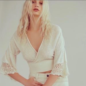 Free People Moonlight Dancer
Crochet Wrap Top, Color Ivory, Size XS.